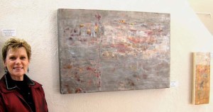 Martha Rea Baker with her encaustic, "Alchemy VII--Purity"